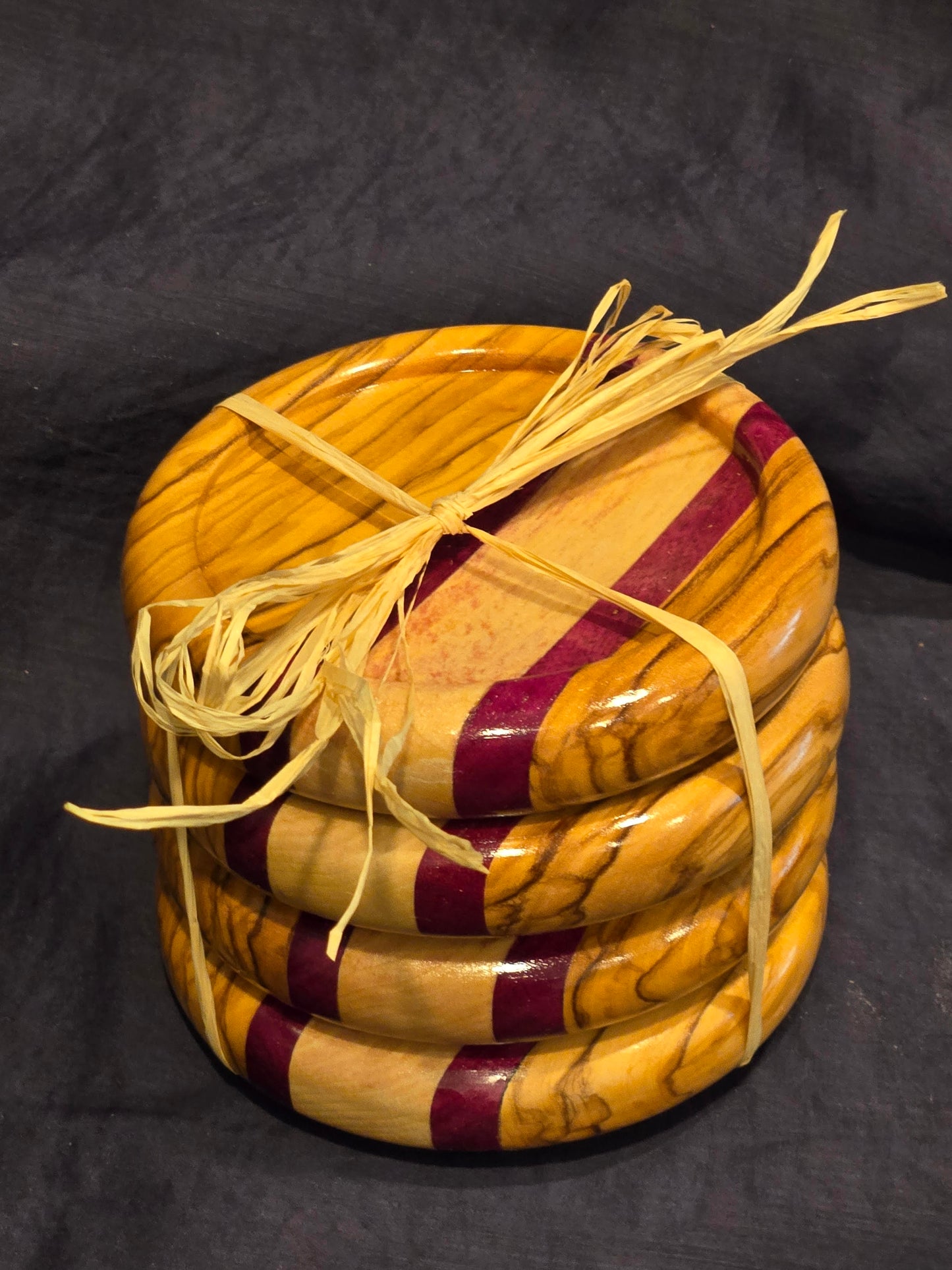 4” Coasters - Set of Four - Olive Wood							$50.00