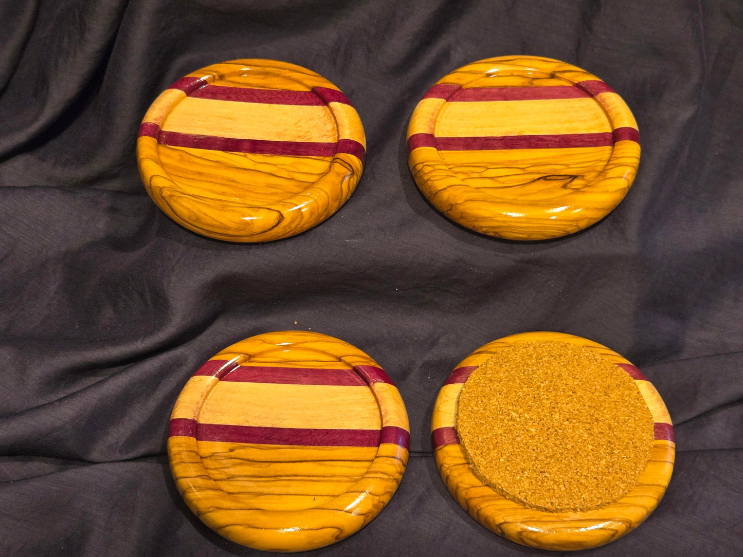 4” Coasters - Set of Four - Olive Wood							$50.00